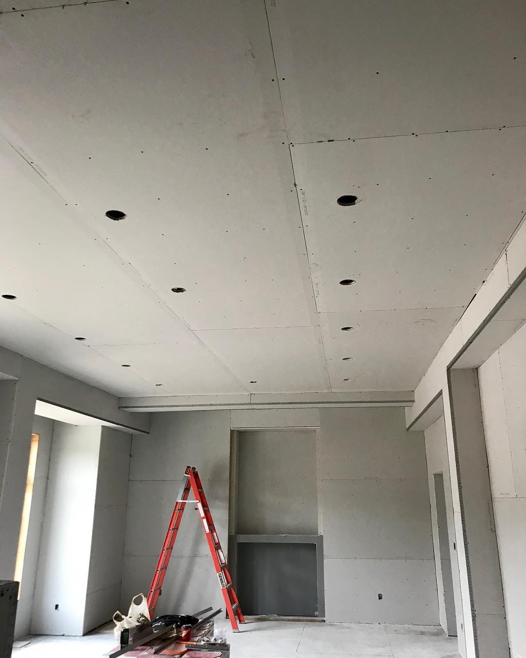 drywall installation before and after